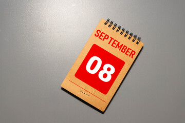 Wooden calendar with the date September 8