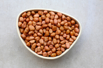 Raw peanuts with red skin