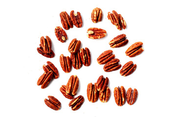 Delicious salted pecan nuts scattered.