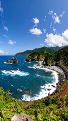 Fototapeta premium Coastal highway winding through rugged terrain