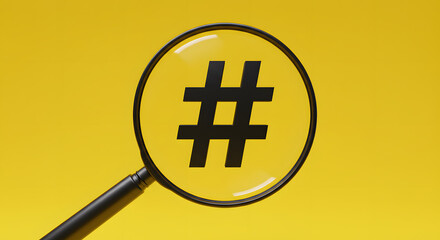 Fototapeta premium Magnifier focuses on the Hashtag Icon. Analyzing or reviewing business job or employee performance