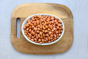 Raw peanuts with red skin