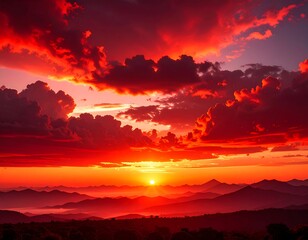 Dramatic fiery sunset over mountain range