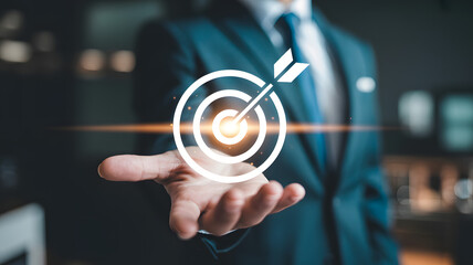 Businessman presenting target icon representing success, goals, and achievement