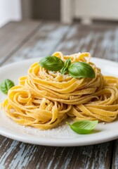 Elegant tagliatelle nests adorned with fresh basil on rustic wooden table