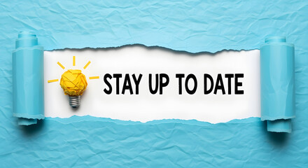 Stay Up To Date Concept With Torn Blue Paper And A Creative Light Bulb Icon Revealing The Information On White Surface