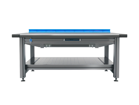 Industrial workstation with a blue-lit inspection surface