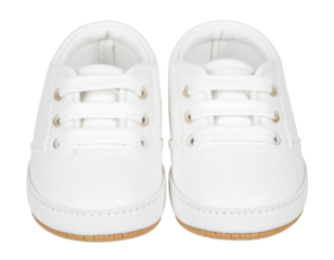 A pair of white soft-soled baby shoes, designed for comfort and ease of wear for newborns and infants, isolated on a white background.