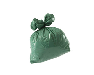 Green plastic trash bag isolated on white background for waste management and recycling concepts
