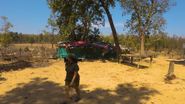 Female Wildlife Photographer Heading for Thrilling Forest Safari - Powered by Adobe