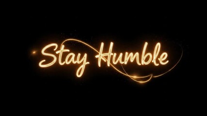 Animated Motivational Message: Glowing 'Stay Humble' Text with Sparkling Visual Effects