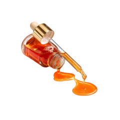 Amber Essential Oil Pouring from Dropper Bottle