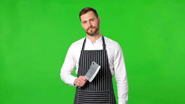 Professional Butcher Confidently Poses with a Meat Cleaver on a Green Screen