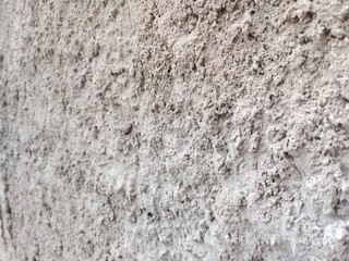 Close-up view of dry soil surface showing natural texture and earthy details