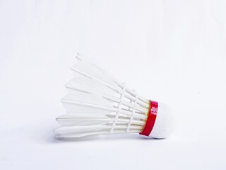 Badminton shuttlecock photographed on a white background.