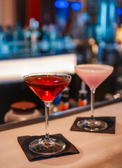 close-up of elegant cocktails served at a stylish martini bar