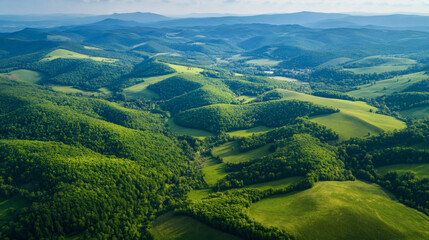 Expansive vista of rolling hills and forests.
