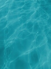 Obraz premium Close-Up View of Crystal Clear Turquoise Water with Gentle Ripples and Reflections