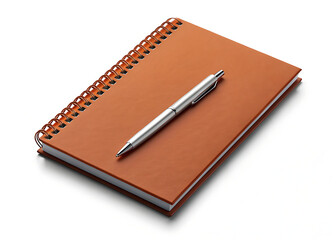 A spiral notebook with a brown cover and a silver pen lying on top of it on a white surface