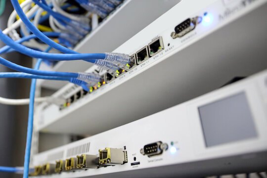 LAN internet network cable or RJ45 UTP fiber optic connect to network management equipment for cloud computing computer data link file transfer or wifi networking devices technology server system.