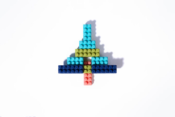 Fototapeta premium Christmas Tree Shape Made of Colorful Building Blocks