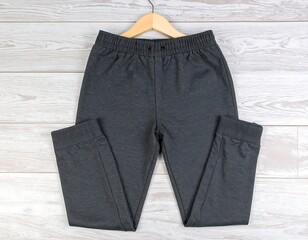 Gray sweatpants on hanger