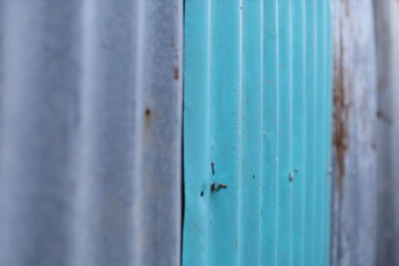 Close-up of rusty zinc texture with natural corrosion patterns.Old Zinc wall rust background or texture.
