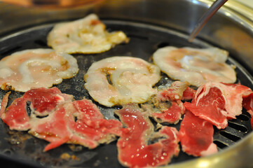 barbecued beef or grilled beef and grilled pork on the broiler or Korean bbq