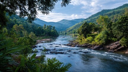 River flowing through lush mountain valley