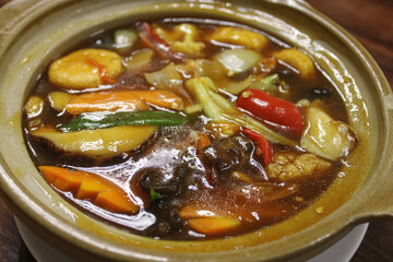 Delicious Chinese Claypot with Tofu, Seafood, and Fresh Vegetables
