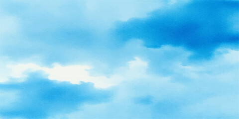 Fluffy white clouds drift across a beautiful bright blue summer sky