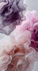 Fototapeta premium Soft, flowing fabrics in shades of pink, purple, and beige