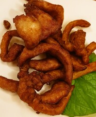Authentic Thai Fried Sun-Dried Pork – Crispy and Juicy Moo Dad Deaw Served on Fresh Lettuce