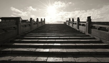 Ancient stone steps leading upward to a sunlit sky