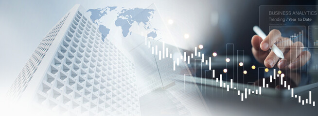 Business, finance and investment concept. Finance analyst using digital tablet analyzing and calculating financial data with economic graph growth chart, Business strategy and planning