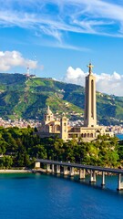 Obraz premium Coastal religious complex, lush hills