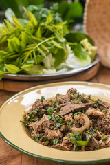 Northern Thai food: Pork Larb in an old-fashioned dish, (Larb Moo)