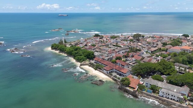 4K drone footage showcasing Galle Fort and the beautiful Sri Lankan coastline showcasing the historic streets, the iconic lighthouse, and sweeping ocean views from above.