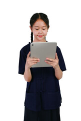 Portrait of Asian girl kid in farmer shirt or mohom shirt standing with playing tablet computer isolated on white background.