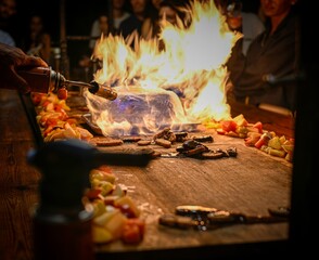 High resolution color image of burning a huge marshmallow for a dessert with a gas torch- Israel