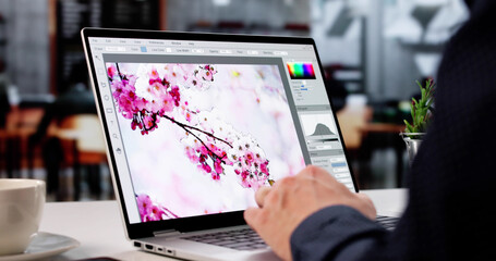 Young Male Designer Editing Photos