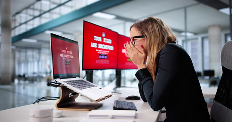 Cybersecurity Crisis: Woman Frantically Encrypting Hacked Laptop