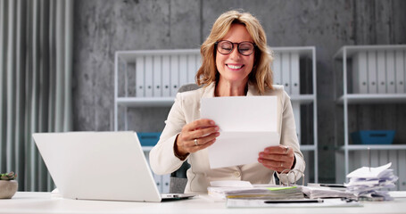 Employee Receives Promotion Letter From Executive