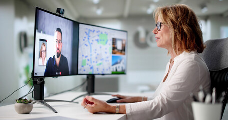 Fototapeta premium Senior Real Estate Realtor Assisting Elderly Client Via Remote