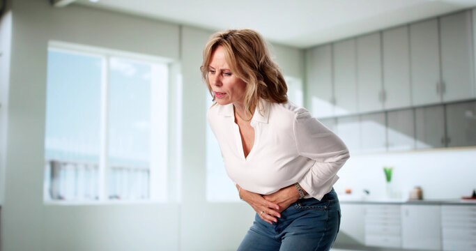 Senior Woman With Stomach Pain: Recognizing Symptoms