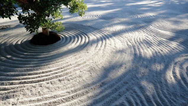 Zen garden with raked sand patterns and a tree