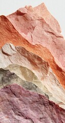 Layered, textured, pastel-colored rocks