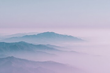 Misty mountain range, soft pastel colors