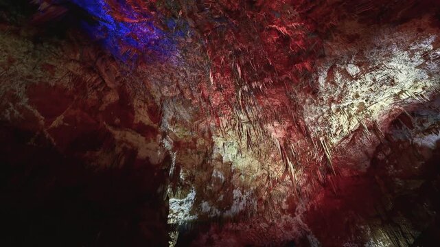 Lights changing color in the Prometheus Cave near Kutaisi, Georgia