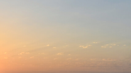 Golden yellow orange blue sky and cloud sunrise sunset. Morning evening sky. Cloudscape background. Beautiful nature.